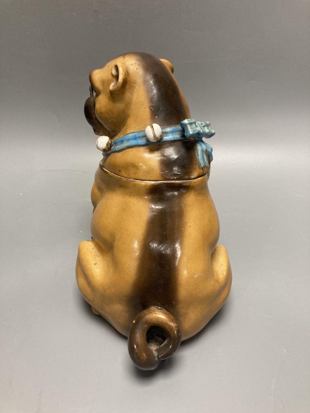 A German porcelain pug tobacco jar and cover, late 19th century, height 18.5cm